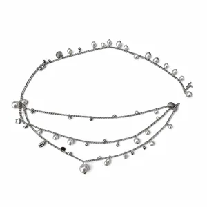 Multi-layer pearl waist chain for women, elegant body chain with shell and star pendants.