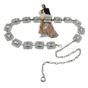 Elegant silver metal chain belt with crystal rhinestone gems for women dress accessories.