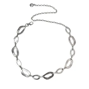 Vintage geometric metal chain belt for women, silver distressed waist jewelry accessory.