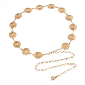 Gold flower chain belt detail showing delicate metal petals and adjustable link design.