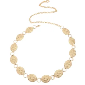 Detail view of the vintage gold metal disc waist chain, adjustable bohemian body jewelry.