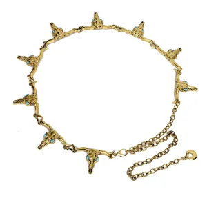 Vintage gold waist chain featuring bull skull charms and turquoise for women's dresses.