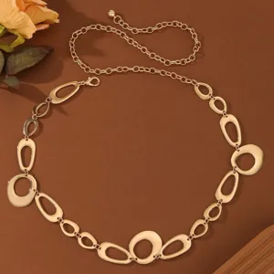Golden metal chain belt featuring interlocking geometric oval links and adjustable extension chain.