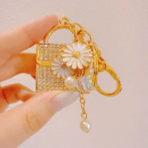 Cute metal rhinestone daisy handbag keychain with pearls, miniature cute bag charm pendant.