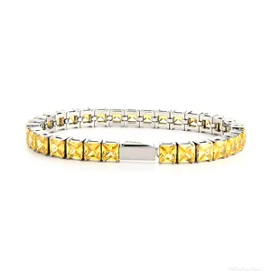 Silver tone stainless steel square yellow cubic zirconia tennis bracelet for women.