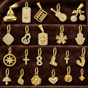 Assorted gold-plated cubic zirconia pendant charms for DIY jewelry making and necklace accessories.