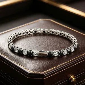 Close-up detail of a stunning tennis bracelet featuring alternating black and clear cubic zirconia stones.