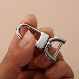 Stainless steel spring snap hook detail view, polished metal finish keyring hardware.
