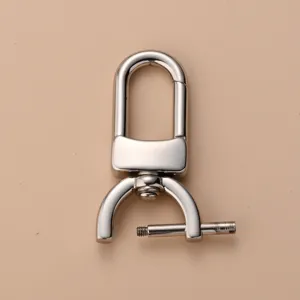 Stainless steel swivel snap hook detail shot, bag hardware accessory and keychain ring fastener.