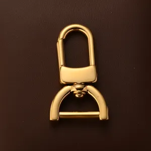 Gold metal swivel lobster clasp bag hardware keychain accessory detail shot for DIY crafts