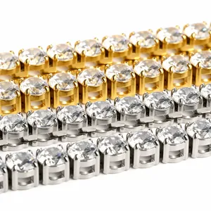 Close-up detail shot of 3-5mm classic prong-set rhinestone tennis chain links in gold and silver.