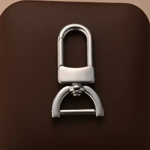 Stainless steel spring snap hook swivel lobster clasping D-ring for bags keychains.