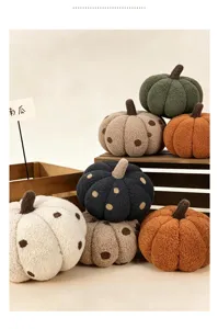 Plush pumpkin throw pillow set, soft stuffed doll with polka dot design for home decor.
