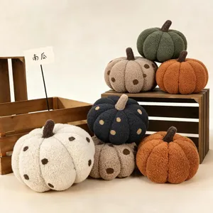 Cute plush pumpkin pillow set, soft stuffed toy with cute polka dot design for home decor.