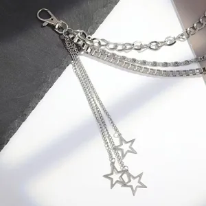 Punk style multi-layer metal pants chain with hollow star pendants for edgy hip-hop fashion.