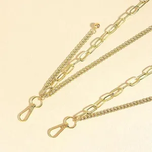 Multi-layer gold metal pants chain hip-hop streetwear trouser chain fashion accessory detail.