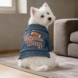 Cute small dog denim jacket with leash ring, winter pet clothes detail showcasing back embroidery.