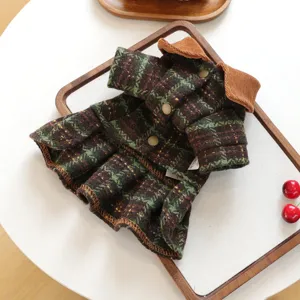 Pet dog dress detail view, winter plaid pleated skirt with brown corduroy collar for small dogs.