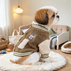 Cozy brown and beige pet fleece varsity jacket detail, featuring cute bear embroidery.