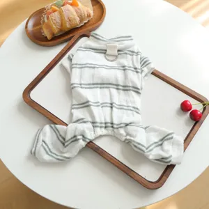 Cozy striped pet pajamas detail shot, soft fabric four-leg pet clothing with leash ring.