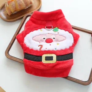 Cute plush Christmas dog coat detail view, featuring Santa Claus embroidery and warm red fleece fabric.