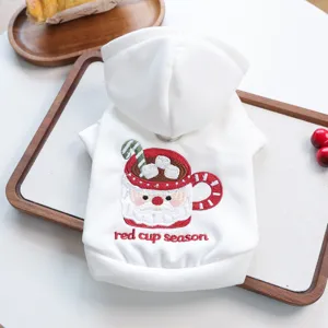 Detailed view of white pet hoodie with cute Christmas Santa mug embroidery for small dogs.