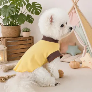 Cute pet dog undershirt detail view, yellow and brown design for small puppies in spring autumn.