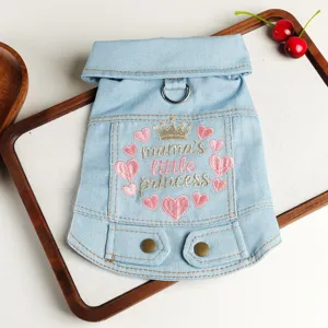 Cute blue denim pet jacket for small dogs, featuring adorable crown embroidery and hearts.