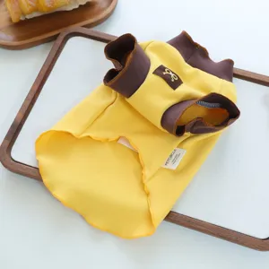 Details of yellow and brown pet dog clothes, soft roll-edge puppy undershirt for small dogs.