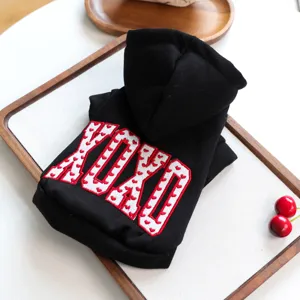 Black pet hoodie for small dogs, cute Valentine sweatshirt with hood and heart embroidery.