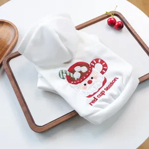 Cute Christmas pet hoodie detail showing Santa embroidery and white hooded design for small dogs.
