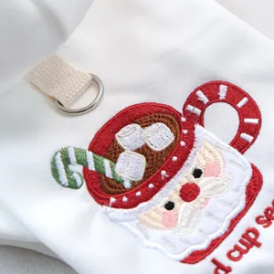 Detailed view of pet Christmas hoodie for small dogs, festive embroidery design with cup.