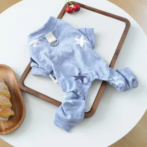 Blue pet jumpsuit with cute star pattern, soft fabric and convenient leash ring for daily wear.