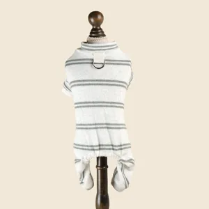 Close-up detail of soft striped pet knitwear jumpsuit with back D-ring for autumn wear.