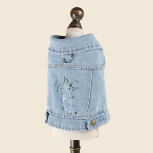 Pet denim jacket details, lapel collar with leash D-ring and colorful ink graffiti design.