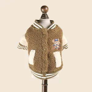 Cute brown fleece dog varsity jacket with snap buttons, striped trim and sweet bear patch.