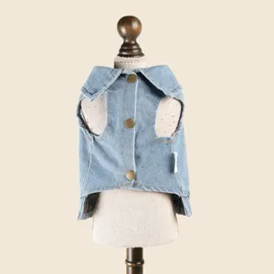 Pet denim vest detail view showing lapel design, metal buttons and quality fabric.