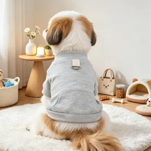 Cute grey dog hoodie with D-ring and pocket, shown in a cozy home setting detail shot.