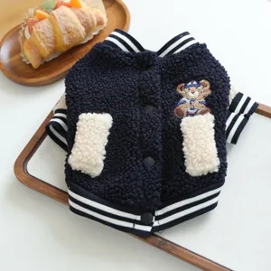 Cozy navy blue pet baseball jacket featuring cute bear embroidery and warm fleece material.