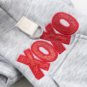 Grey pet hoodie detail, cute dog clothes with red glitter XOXO embroidery and D-ring loop.
