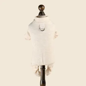 Soft beige pet jumpsuit for dogs and cats, cozy winter home wear with back leash ring.