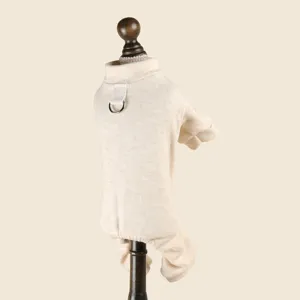 Beige knitted pet jumpsuit detail, cozy dog homewear with turtleneck and metal D-ring.
