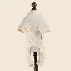 Beige pet four-legged home wear detail, soft knit fabric texture for cozy autumn winter.