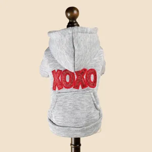 Grey pet hoodie detail, cute puppy clothes back design, soft fabric with red glitter text.