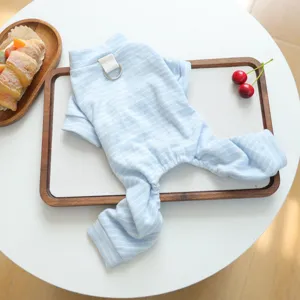 Cute blue striped pet jumpsuit detail, soft four-legged dog clothes for cozy indoor wear.