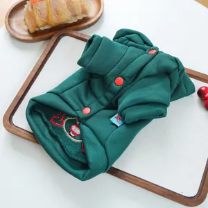 Felpa natalizia per cani verde scuro con bottoni rossi, abbigliamento festivo per animali.