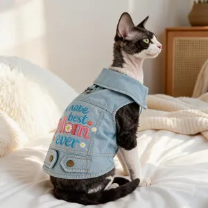 Cute denim cat vest with lovely floral embroidery and leash ring for small pets.