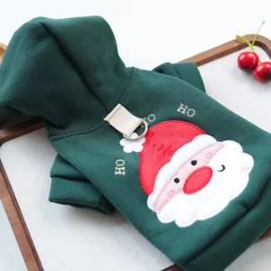Detail view of dark green pet Christmas hoodie for small dogs with Santa Claus embroidery.