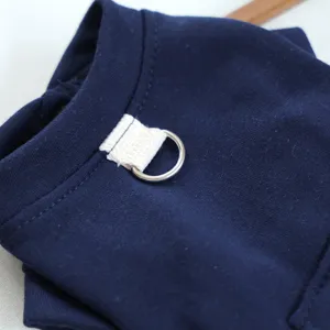 Detail of dark blue pet hoodie with metal D-ring for small dogs spring and autumn daily wear.