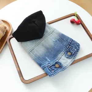 Detailed view of fashionable pet denim hoodie for small dogs, vintage blue and black style.